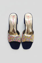Load image into Gallery viewer, Navy blue high-heeled shoes with colorful bead embellishments on a gray surface