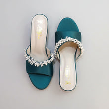 Load image into Gallery viewer, Teal sandals with pearl embellishments on a gray surface