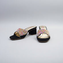 Load image into Gallery viewer, Black high-heeled shoes with colorful bead embellishments on a gray surface