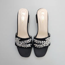 Load image into Gallery viewer, Black sandals with crystal embellishments on a gray surface