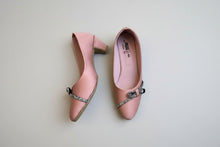 Load image into Gallery viewer, Pair of pink shoes with embellishments on a gray surface