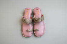 Load image into Gallery viewer, Pink sandals with gold embellishments on a gray surface