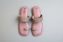 Load image into Gallery viewer, Pink sandals with gold straps on a gray surface