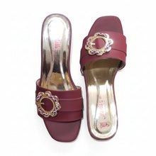 Load image into Gallery viewer, Pair of maroon high-heeled shoes with decorative gold and purple embellishments on a gray marble surface.