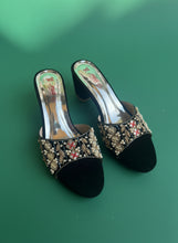 Load image into Gallery viewer, Pair of embellished black high-heeled shoes on a gray surface
