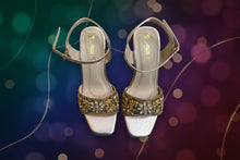 Load image into Gallery viewer, Pair of embellished high-heeled shoes on a gray surface
