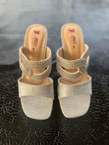 Pair of glittery gold high heeks