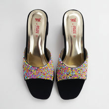 Load image into Gallery viewer, Black high-heeled shoes with colorful bead embellishments on a gray surface
