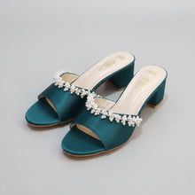 Load image into Gallery viewer, Teal high-heeled shoes with pearl embellishments on a gray surface

