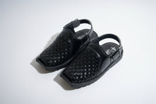 Load image into Gallery viewer, Pair of black woven shoes on a gray surface
