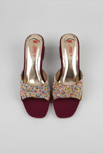 Load image into Gallery viewer, Pair of maroon high-heeled shoes with colorful bead embellishments on a gray surface.
