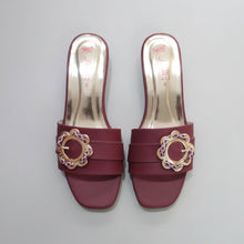 Load image into Gallery viewer, Pair of maroon high-heeled shoes with decorative buckles on a gray surface
