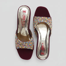 Load image into Gallery viewer, Pair of maroon high-heeled shoes with colorful embellishments on a gray surface
