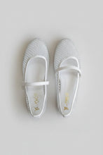 Load image into Gallery viewer, Pair of white mesh shoes on a dark textured surface
