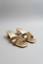 Load image into Gallery viewer, Pair of gold sandals with decorative bow on a gray surface
